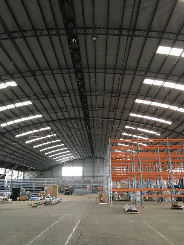 Giant hangar warehouse with powerful lights installed