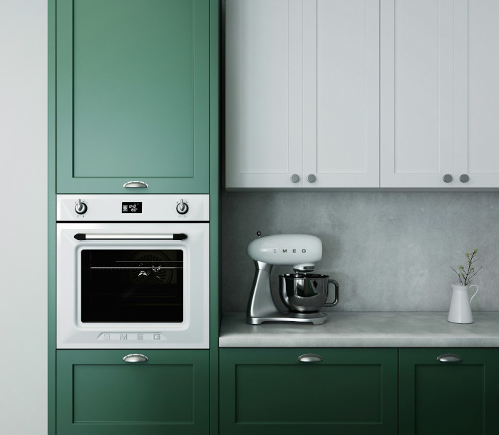 Kitchen with green cabinets. Modern and vintage design.
