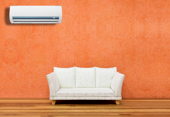 air conditioner with white couch