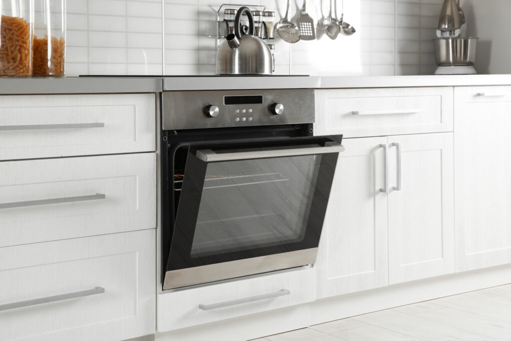Open modern oven built in kitchen furniture