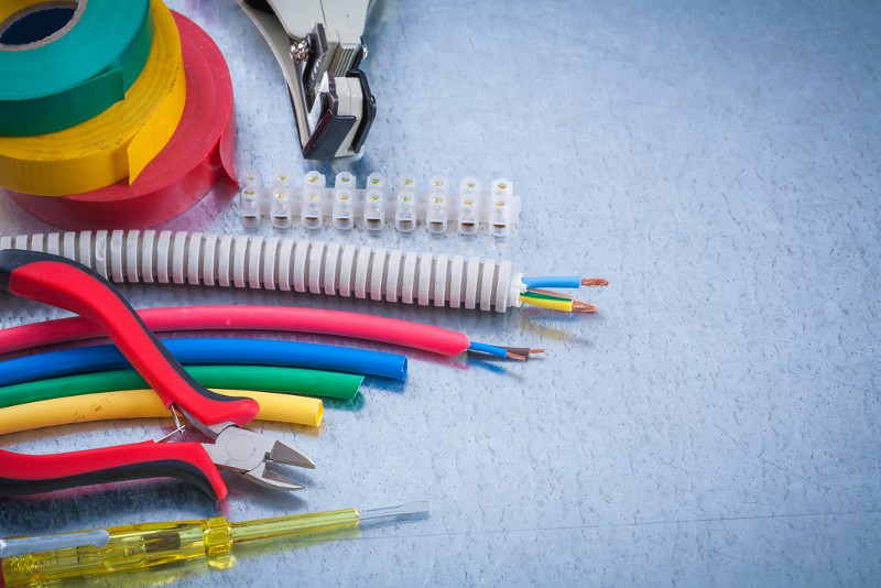 Various cables, duct tape and electrical tools