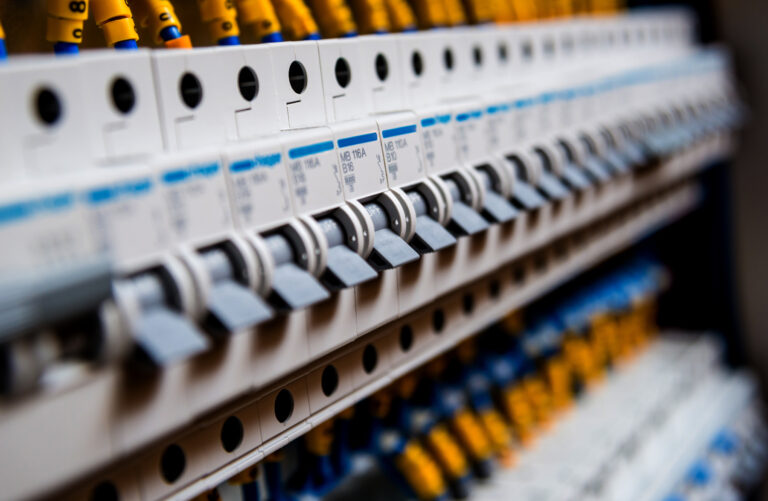 Voltage switchboard with circuit breakers. Electrical background